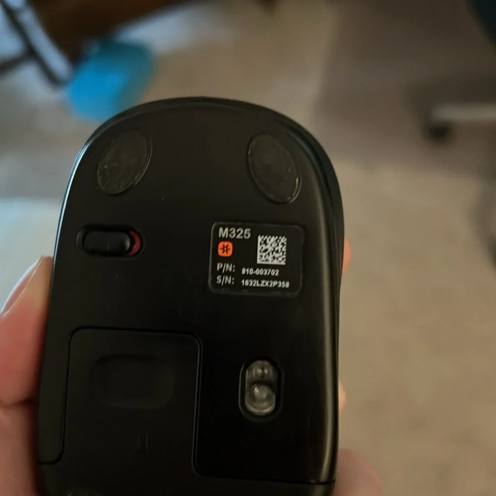 Logitech M325 black and silver wireless mouse